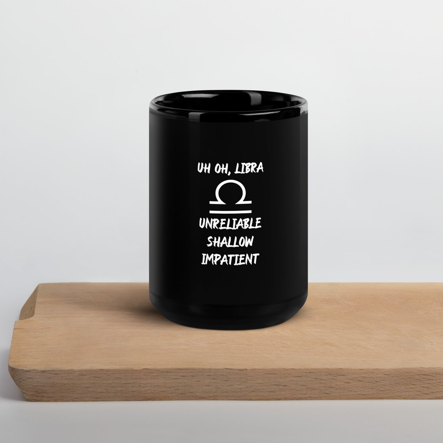 “Uh Oh, Libra” Black Glossy Mug
