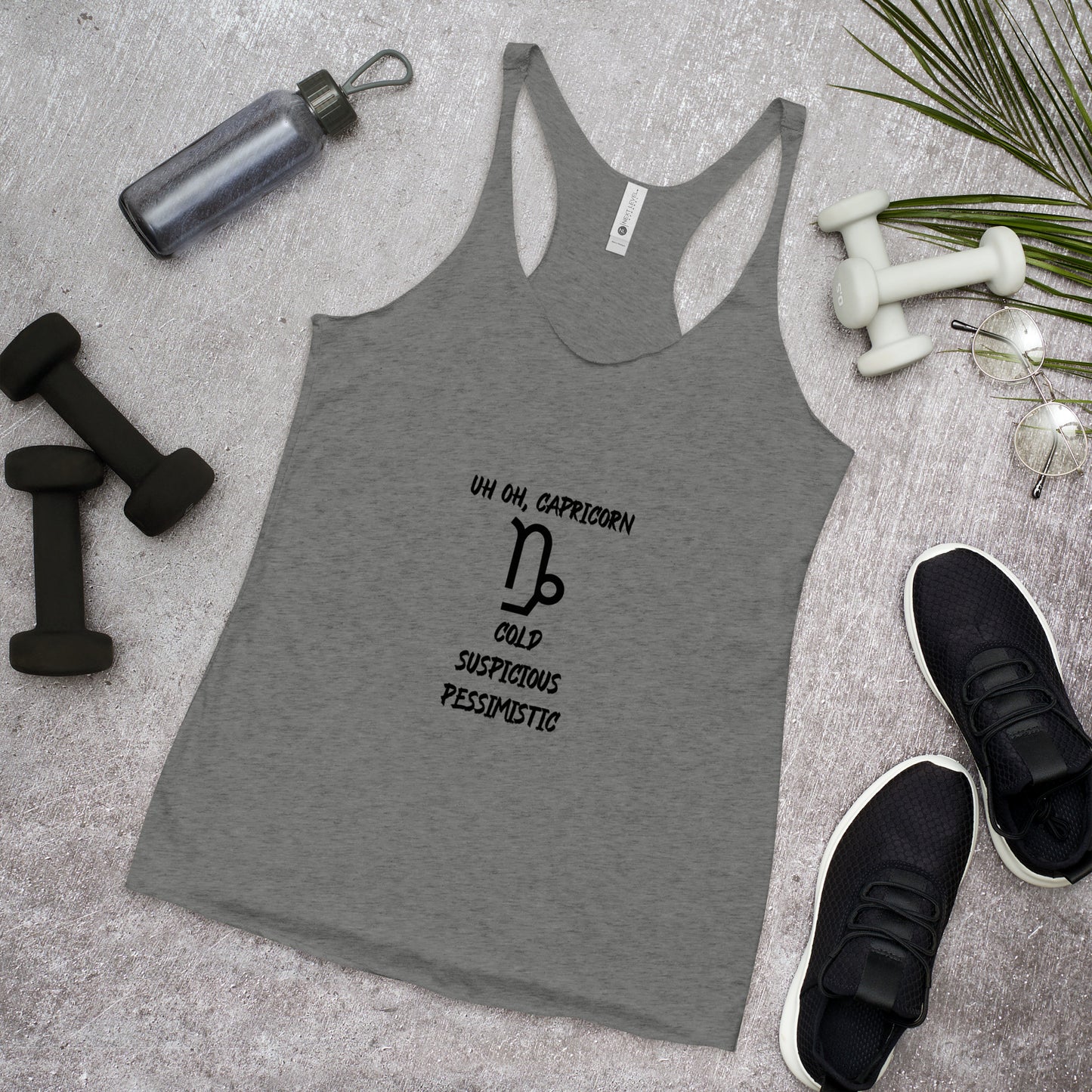 “Uh Oh, Capricorn” Women's Racerback Tank